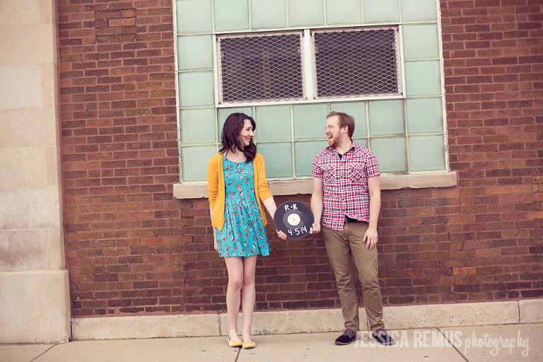 engaged couple by factory in Chicago